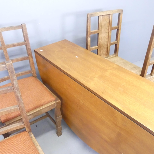 2684 - A pair of Arts and Crafts oak hall chairs with panel and lattice back in the manner of Heals, a pair... 