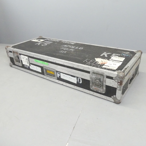 2707 - A metal bound Keyboard travel trunk, labelled Apollo Four 40. 134x25x55cm.