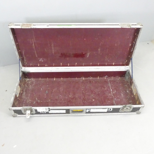 2707 - A metal bound Keyboard travel trunk, labelled Apollo Four 40. 134x25x55cm.