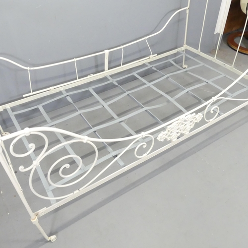 2709 - A continental folding metal framed daybed. Overall 180x97x97cm.