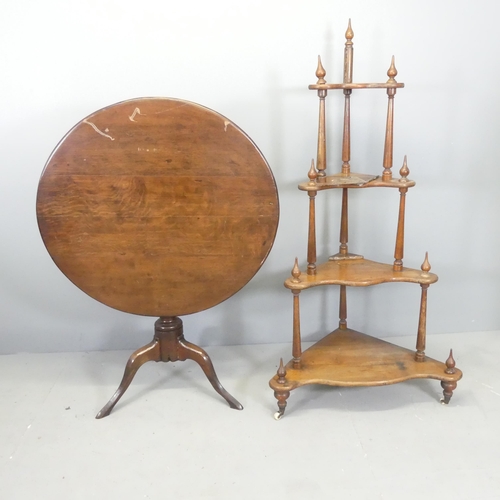 2710 - An antique oak four-tier corner whatnot, height 148cm, and a circular tilt-top table. (2) A/F