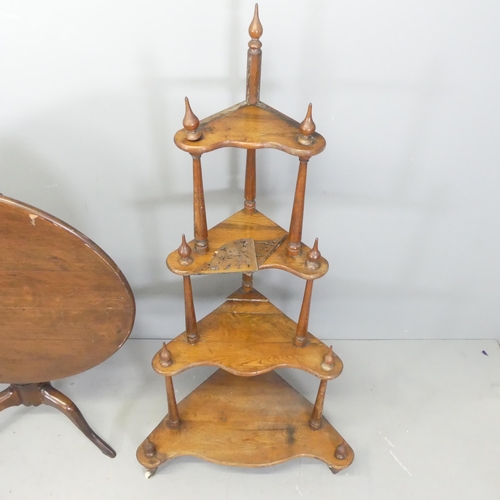 2710 - An antique oak four-tier corner whatnot, height 148cm, and a circular tilt-top table. (2) A/F