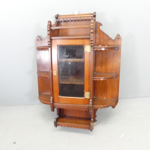 2711 - An Arts and Crafts mahogany hanging cabinet. 70x95x22cm