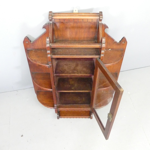 2711 - An Arts and Crafts mahogany hanging cabinet. 70x95x22cm