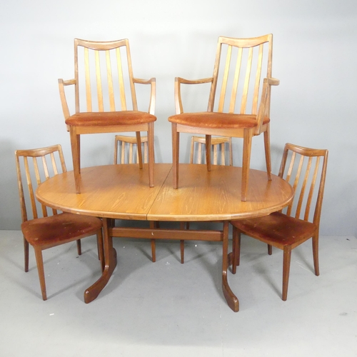 2724 - G-PLAN - A mid-century teak oval draw-leaf dining table and six matching chairs. 164x73x107cm, openi... 