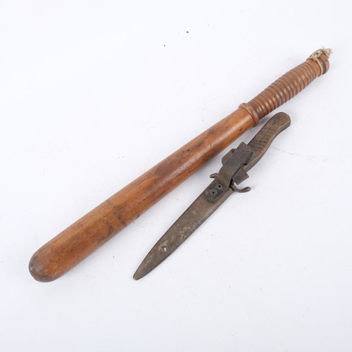 219 - An early 20th century turned wood truncheon with ribbed handle, L47cm, unnamed and an Antique huntin... 