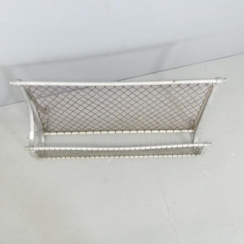 2731 - A mid-century chrome railway luggage rack. Length 92cm.