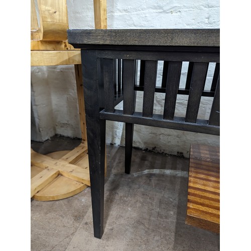 2030 - WILLIAM YEOWARD - A contemporary ebonised Lennox console table. 153x69x36cm