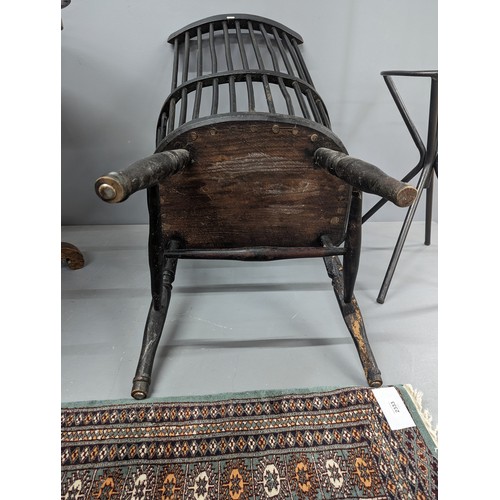 2204 - Two similar ash and elm-seated Welsh comb-back arm chairs.