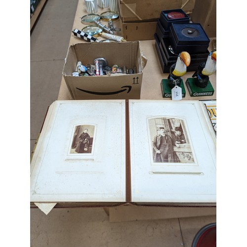 88 - A Victorian velvet covered photograph album, containing a collection of carte de visite and cabinet ... 