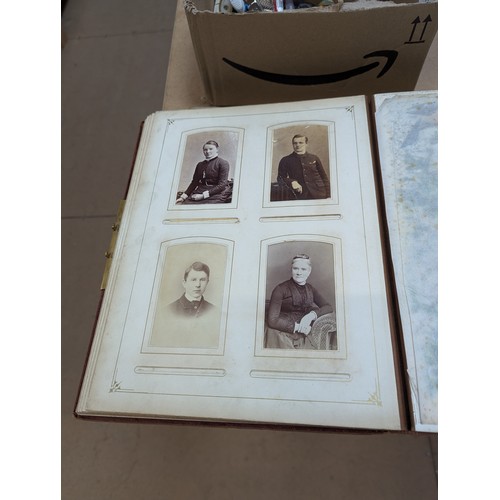 88 - A Victorian velvet covered photograph album, containing a collection of carte de visite and cabinet ... 