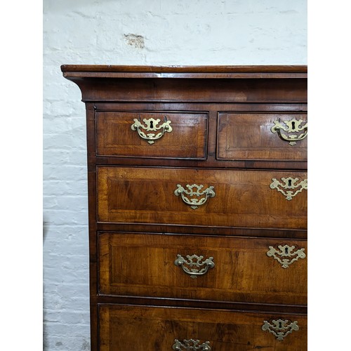 2135 - A George III crossbanded Walnut two-section chest-on-chest of three short and six long drawers. 108x... 