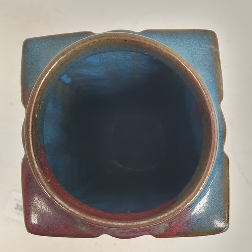 395 - A square Oriental stoneware vase, with blue and red glaze, 23cm