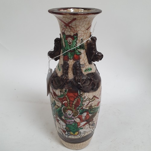 515 - A pair of Japanese crackle glaze vases, with warrior decoration, 24cm, and 2 other Satsuma vases