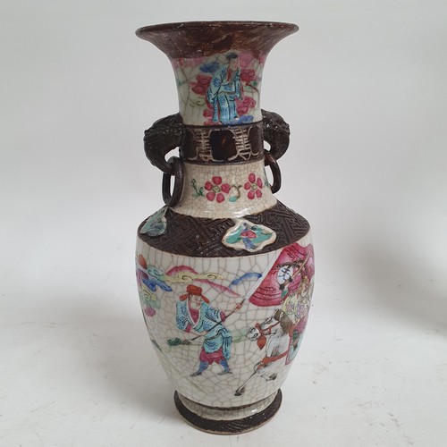 515 - A pair of Japanese crackle glaze vases, with warrior decoration, 24cm, and 2 other Satsuma vases