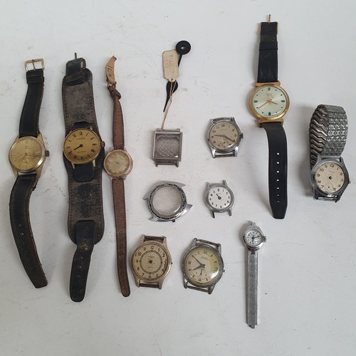 359 - A collection of watch faces and parts, clock movements etc