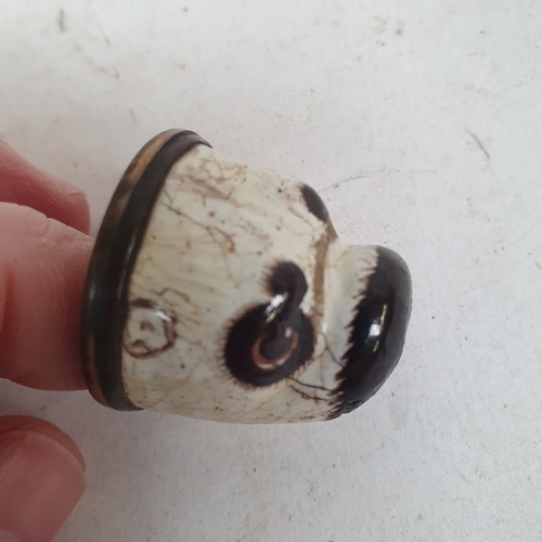 883 - A Staffordshire enamel novelty Pug dog head, 