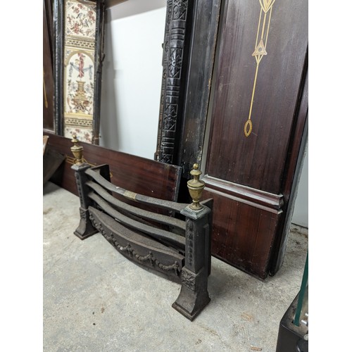 2641 - A Victorian cast iron fireplace with marble surround.