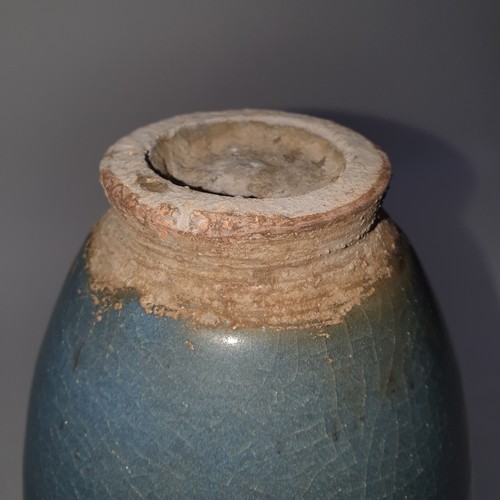 389 - A Chinese glazed stoneware pot with 4 handles, H25cm