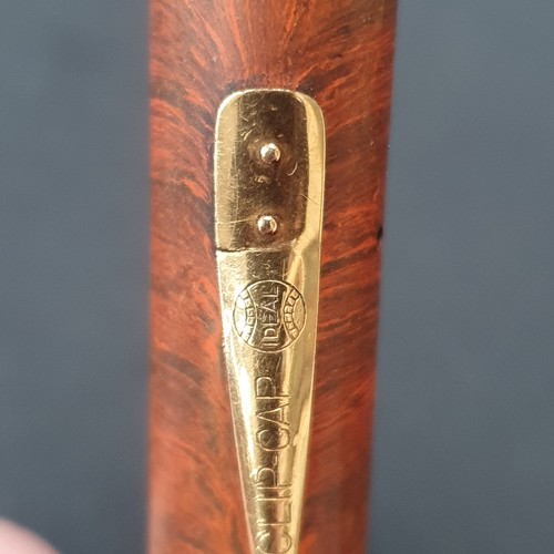 888 - A Watermans marble bodied fountain pen, with a 9ct gold band around the lid, nib is not gold, and a ... 