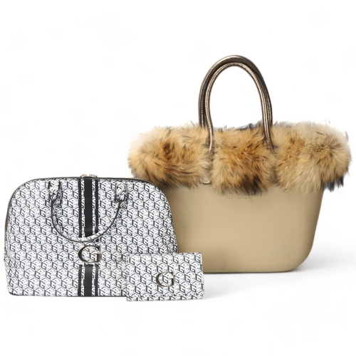 115 - Two designer hand bags, A Guess hand bag and matching purse with faux leather body and leopard skin ... 