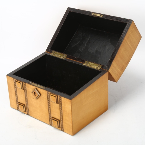 12 - A Victorian satinwood stationery box, with parquetry inlaid Greek Key bands and raised square bosses... 