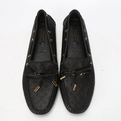 121 - **WITHDRAWN** A pair of Louis Vuitton ladies shoes, size 7, with original box and dust covers.