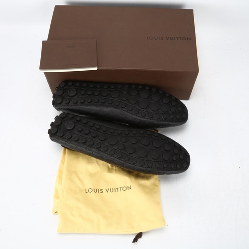 121 - **WITHDRAWN** A pair of Louis Vuitton ladies shoes, size 7, with original box and dust covers.