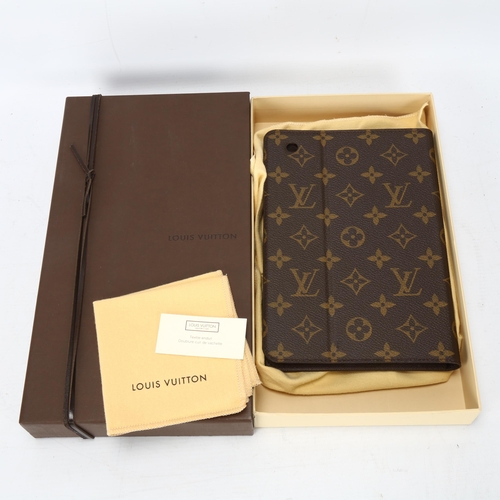 123 - **WITHDRAWN**A Louis Vuitton iPad cover, logo textile cover and leather lining, 3 card holder slots ... 