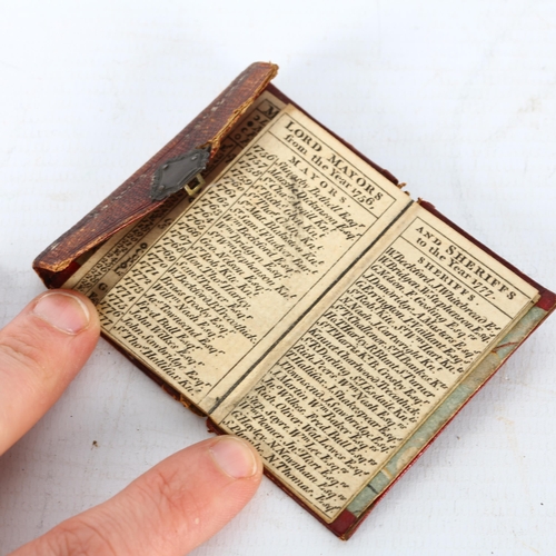 133 - Pocket almanac 1777, in Morocco leather binding with brass lock, 6cm x 4cm