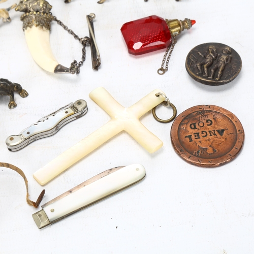 134 - A mixed group of items, including cold plated bronze animals, miniature pocket knives, coins, etc