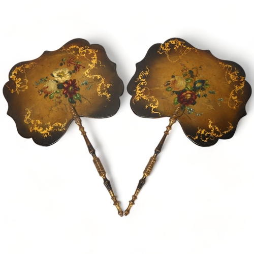 135 - A pair of mid 19th century papier-mache Hand Screens, with hand painted floral spary decoration, and... 