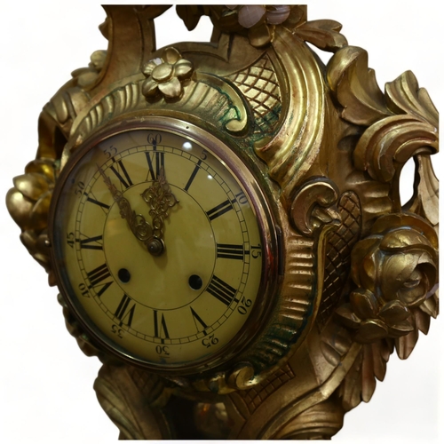 148 - 20th century German carved giltwood-cased cartel wall clock in Rococo style, 8-day striking movement... 