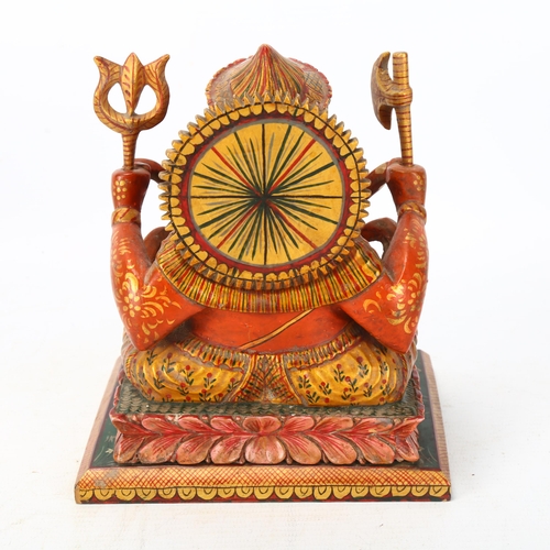 157 - An early 20th century figure of Ganesh, Indian elephant God wood carved and painted, height 15.5cm