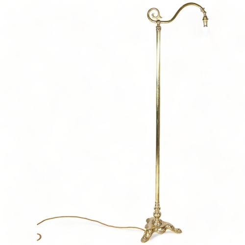 167 - A Victorian polished brass standard lamp, on cast platform base, height 170cm