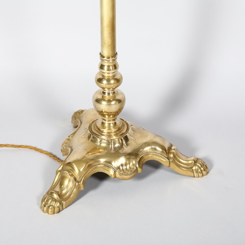 167 - A Victorian polished brass standard lamp, on cast platform base, height 170cm