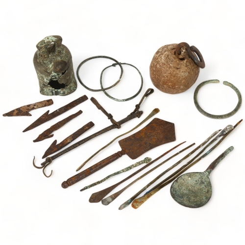 177 - A group of Bronze and other metal antiquities, including a bronze bell, bangles, arrowheads etc.