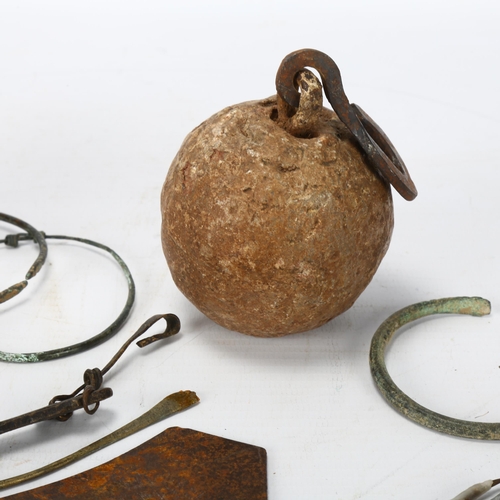 177 - A group of Bronze and other metal antiquities, including a bronze bell, bangles, arrowheads etc.