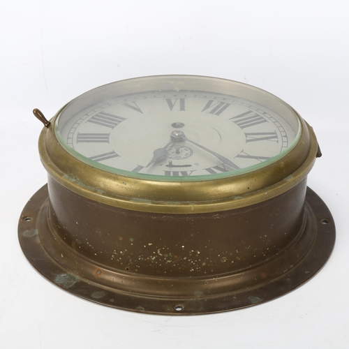 205 - A ship's brass-cased dial wall clock with 8-day movement, bezel diameter 22cm