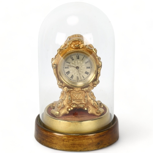 208 - A miniature 19th century balloon cased clock, containing a 17th century movement by James Wightman (... 