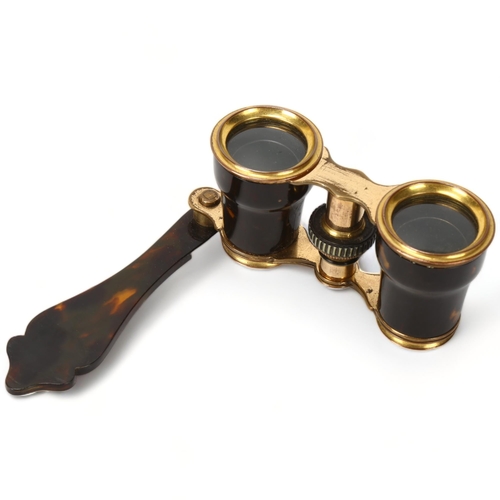 210 - Pair of Victorian tortoiseshell and gilt-metal opera glasses, with folding handle, in Morocco leathe... 