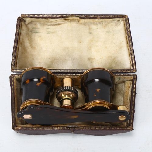 210 - Pair of Victorian tortoiseshell and gilt-metal opera glasses, with folding handle, in Morocco leathe... 