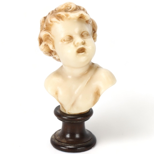 211 - A wax bust classical figure of a young boy, on turned wood stand, height 24cm