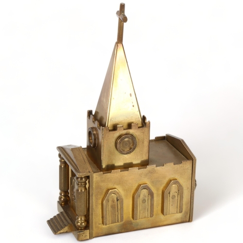 213 - A heavy gauge brass musical box in the form of a church, possibly trench art, height 20cm