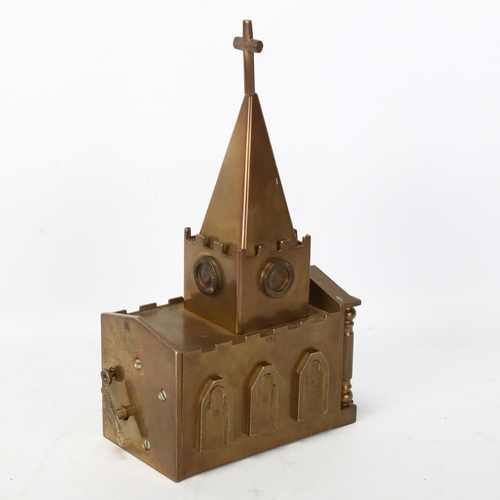 213 - A heavy gauge brass musical box in the form of a church, possibly trench art, height 20cm