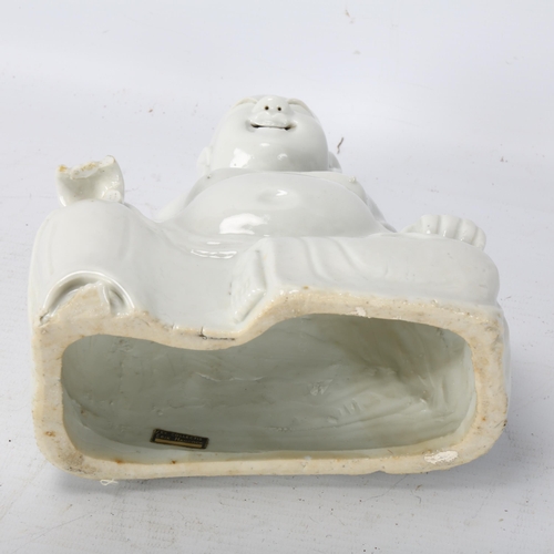 230 - A Chinese Blanc de Chine figure of a laughing Buddah, label under base 