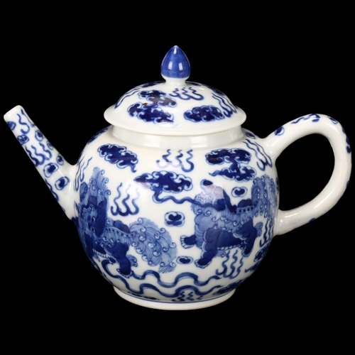 241 - Chinese blue and white porcelain teapot, with dragon decoration, height 14cm