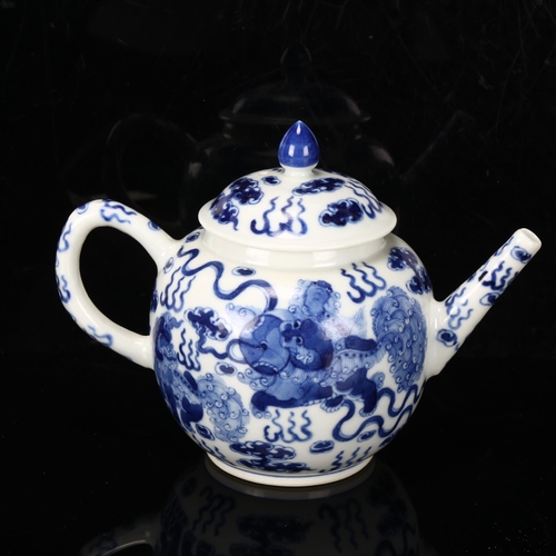 241 - Chinese blue and white porcelain teapot, with dragon decoration, height 14cm