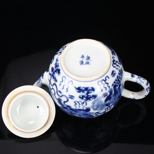 241 - Chinese blue and white porcelain teapot, with dragon decoration, height 14cm