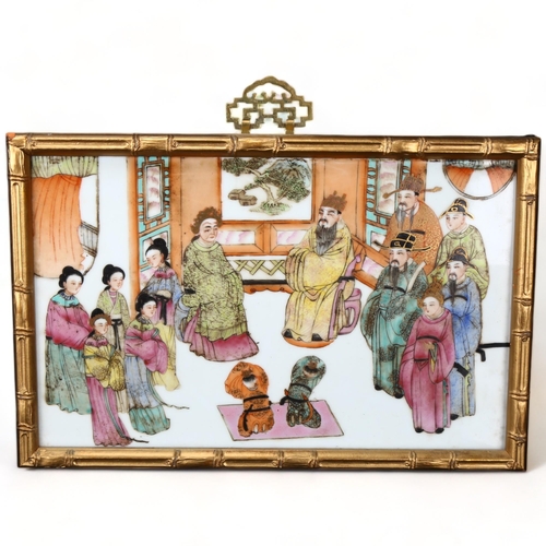 242 - A Chinese white glaze porcelain plaque, with painted and gilded court figures, gilded simulated bamb... 